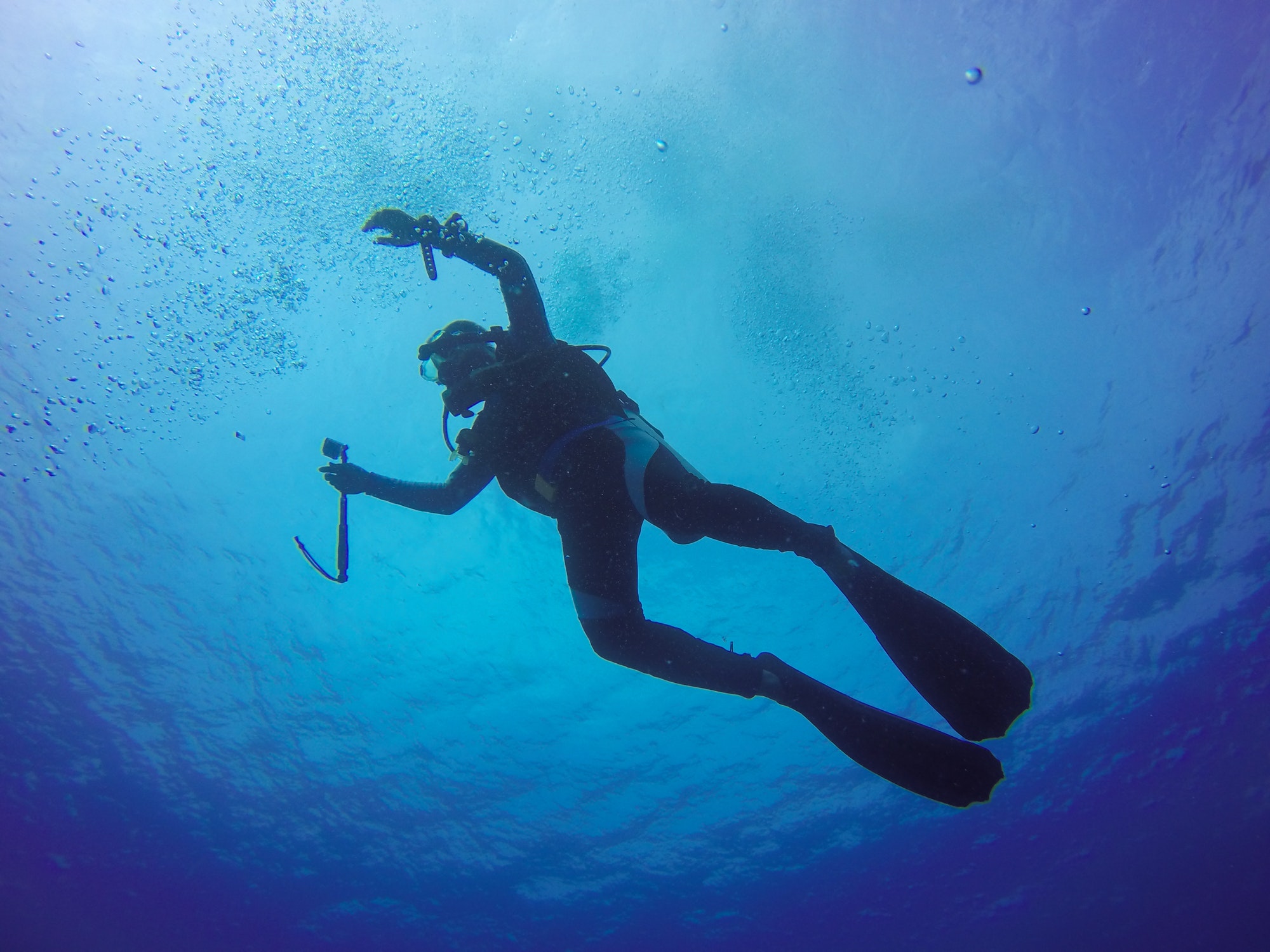 underwater scuba diving selfie shot with selfie stick deep blue sea wide angle shot 1 2.jpg